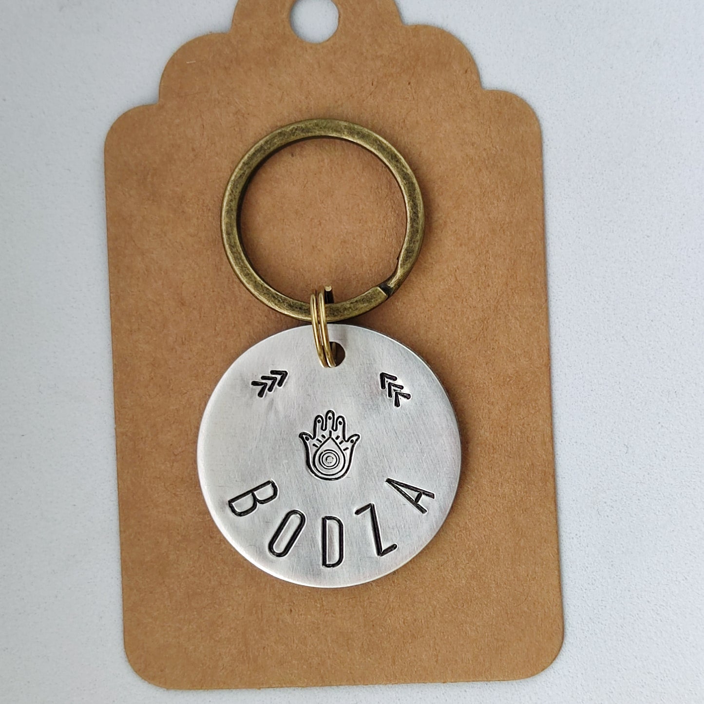 HAMSA – kézműves alumínium biléta (⌀30 mm)